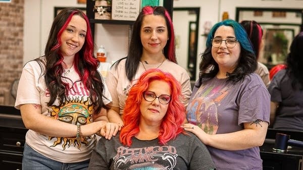 “I always dreamt of owning a salon, but never in a million years did I think I'd be blessed to do it with all three of my kids and my husband,” said Joy Schmidt, owner of Moxie Salon and Spa in Yulee, Florida. Pictured is Schmidt (center) and her three daughters.