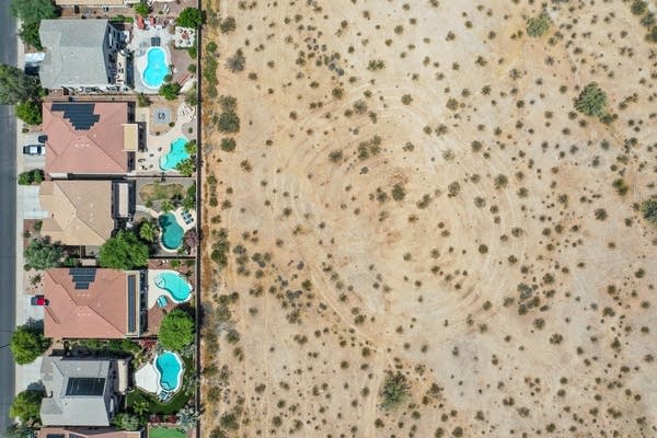 A master-planned community butts up against the desert in Buckeye, AZ.